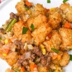 shepherds pie tater tot casserole on a white dinner plate