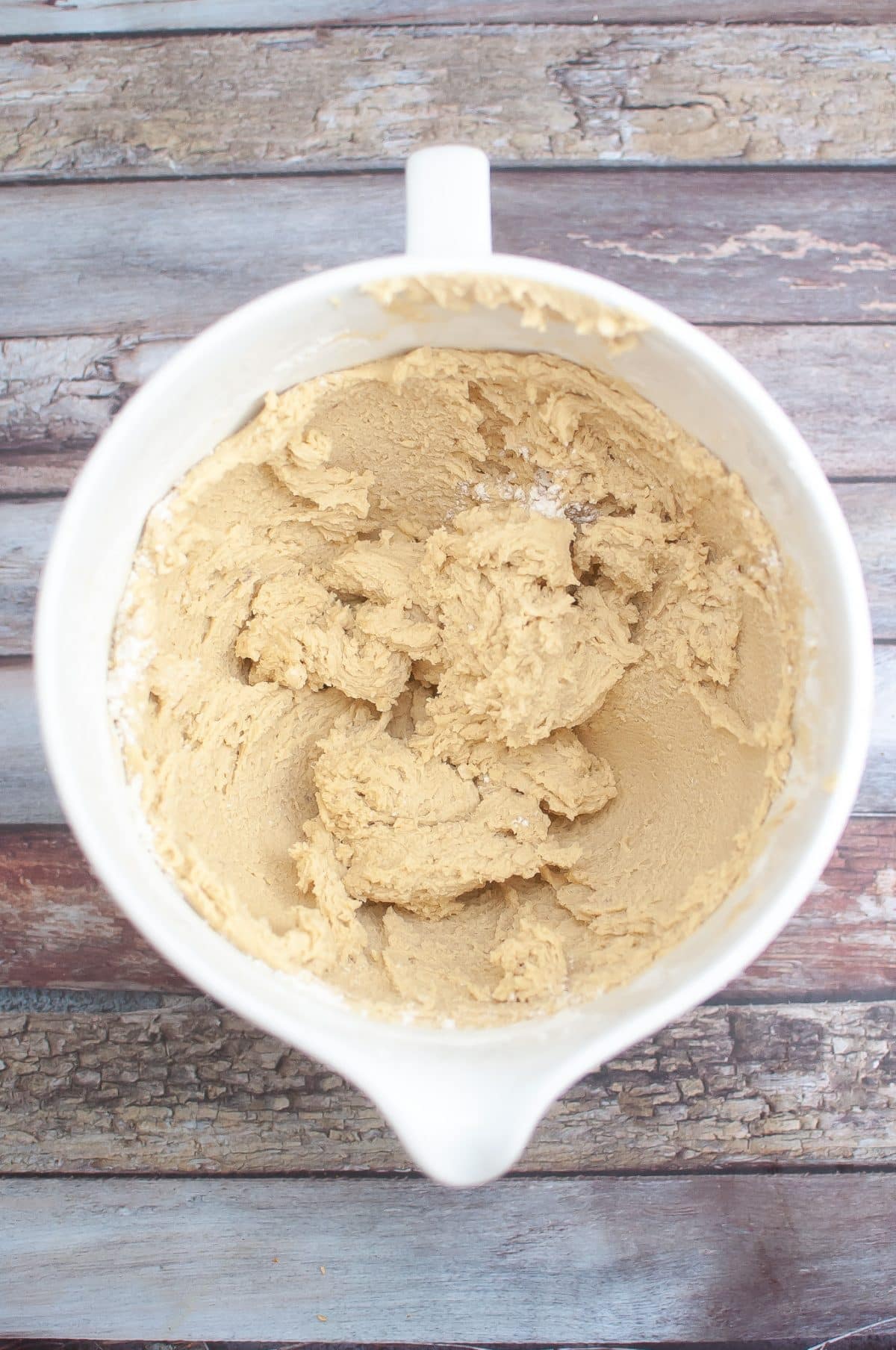 homemade cookie dough in a white mixing bowl
