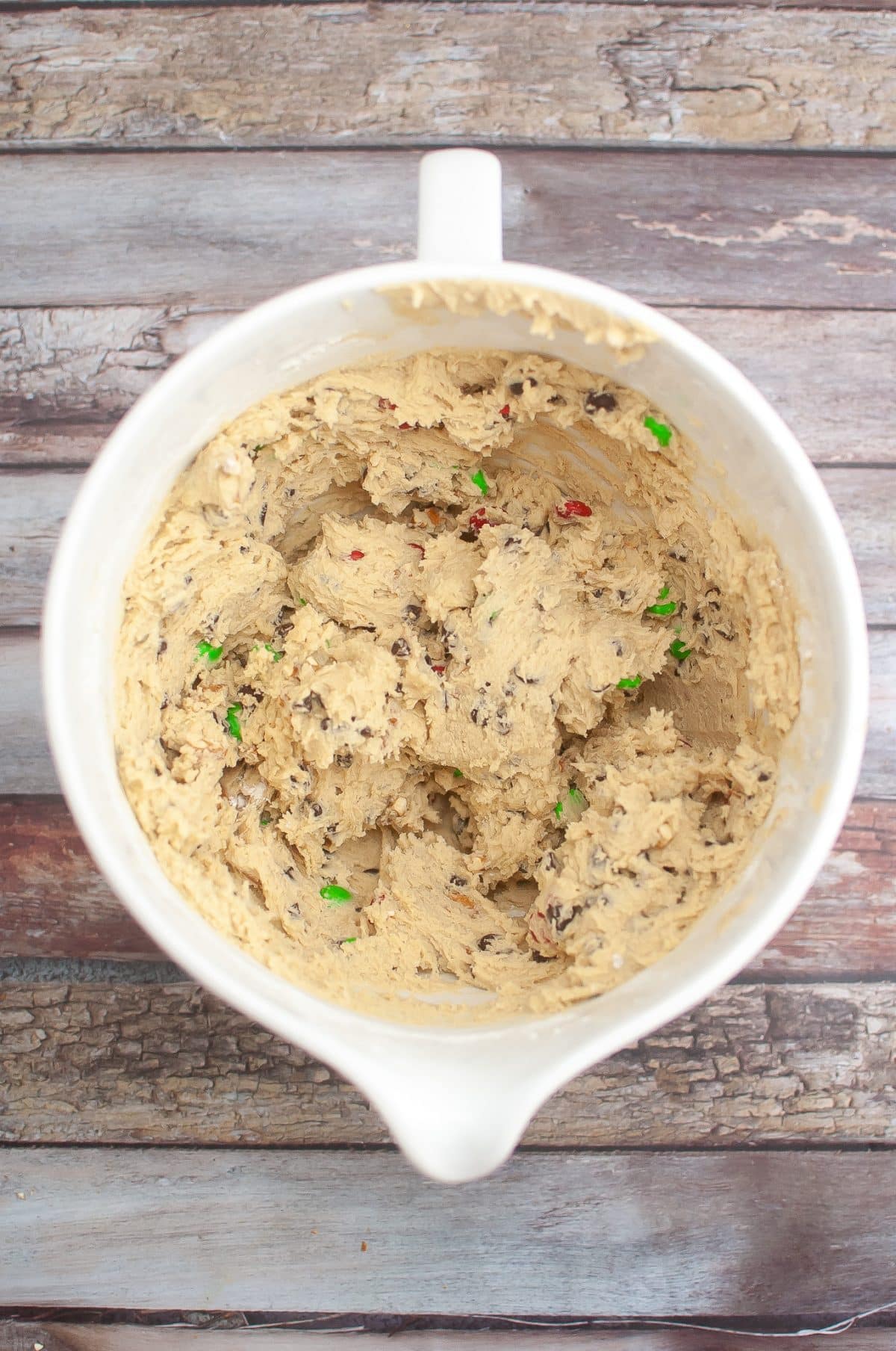 christmas cookie dough in a white mixing bowl