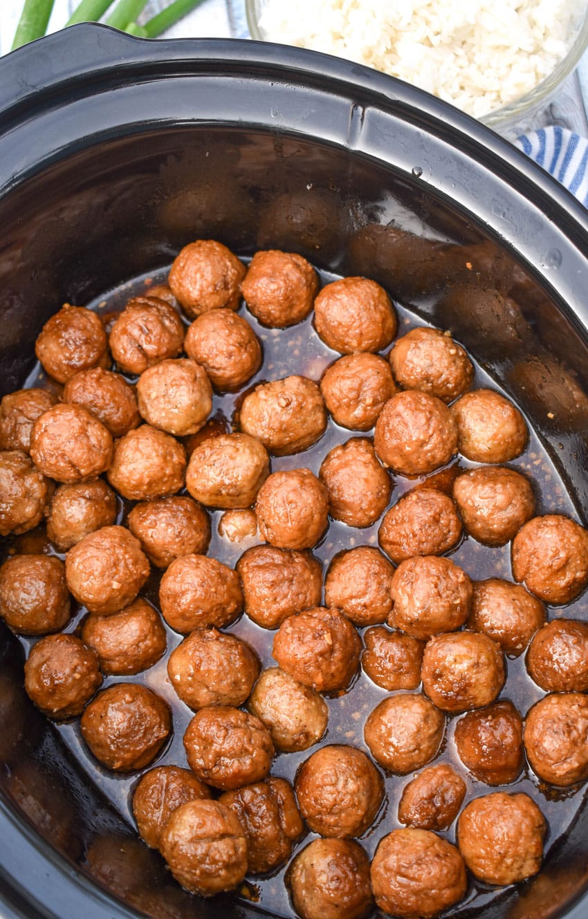 mongolian meatballs in the black crock of a slow cooker