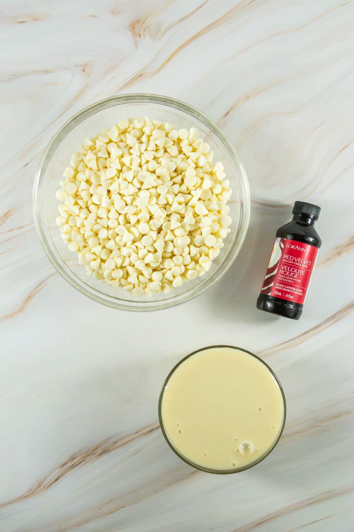 an overhead image showing the measured ingredients needed to make a batch of red velvet fudge