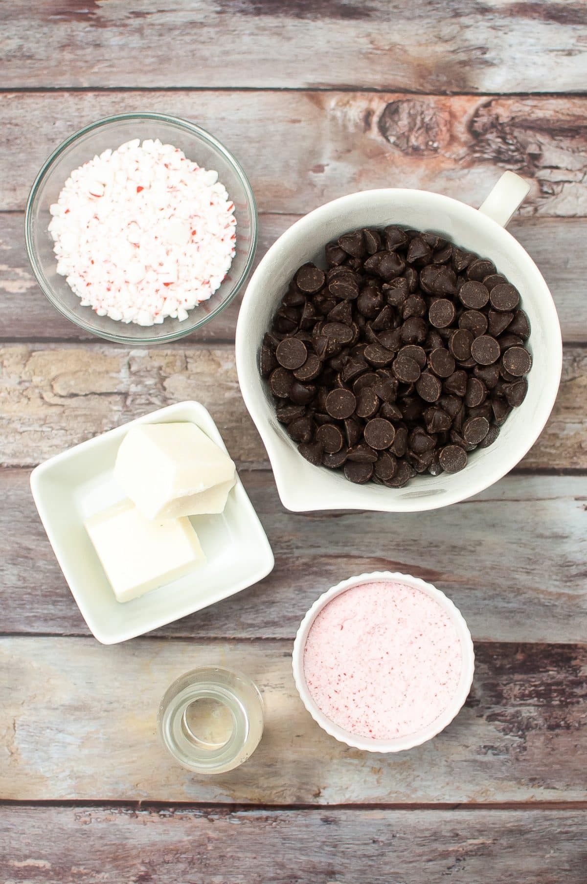 an overhead image showing the measured ingredients needed to make a batch of holiday peppermint bark