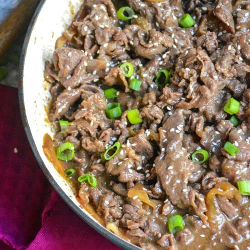 easy beef bulgogi recipe in a shallow blue cast iron skillet