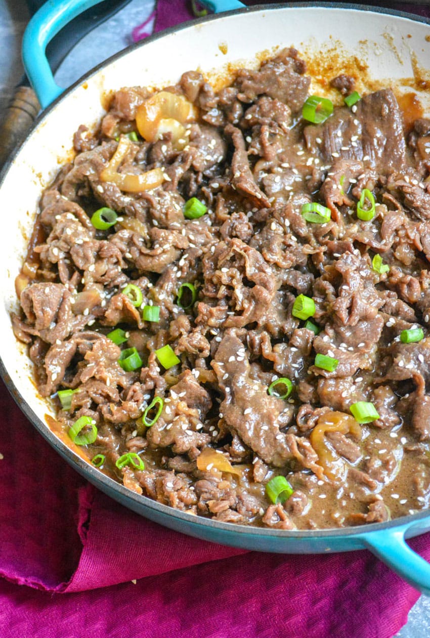 easy beef bulgogi recipe in a shallow blue cast iron skillet