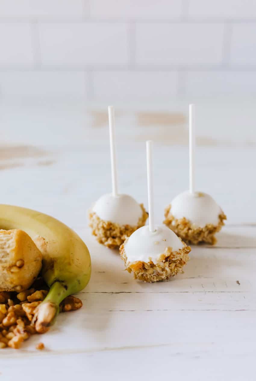 three banana muffin cake pops on wooden table