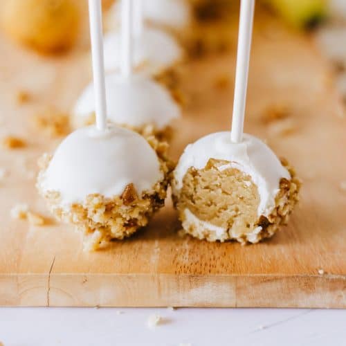 banana bread cake pops on a wooden cutting board
