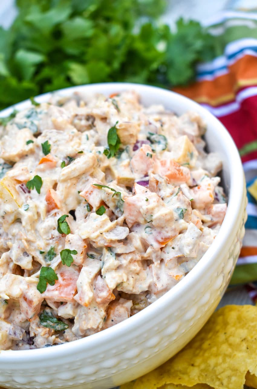 fajita chicken salad in a white serving bowl