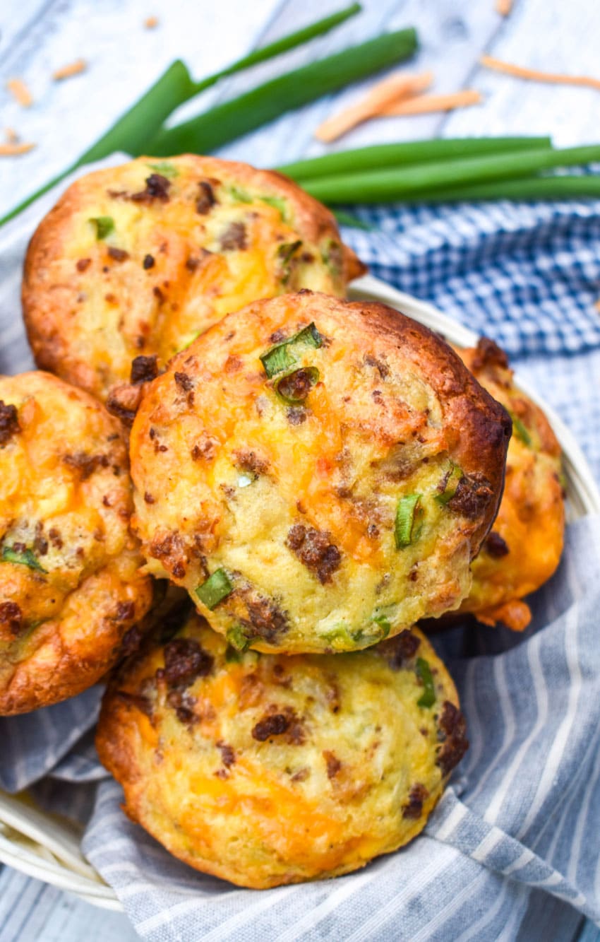 kitchen sink muffins piled in a cloth lined basket