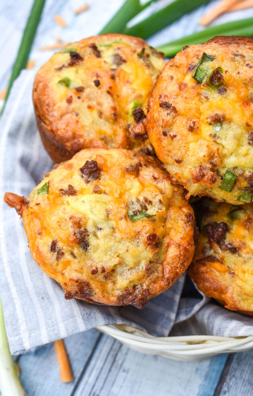 kitchen sink muffins piled in a cloth lined basket