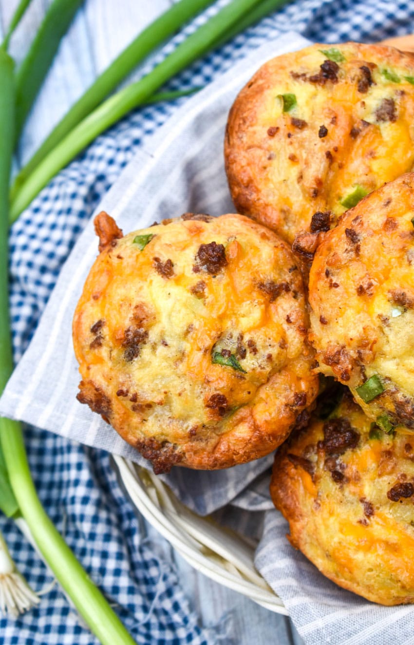 kitchen sink muffins piled in a cloth lined basket