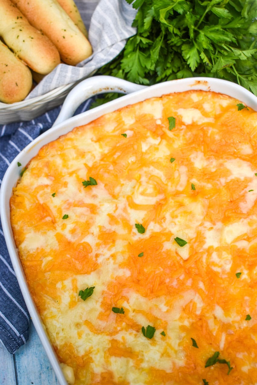baked spaghetti mac and cheese in a white casserole dish