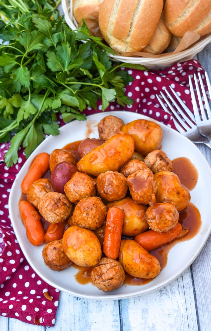 meatball pot roast served on a small white dinner plate