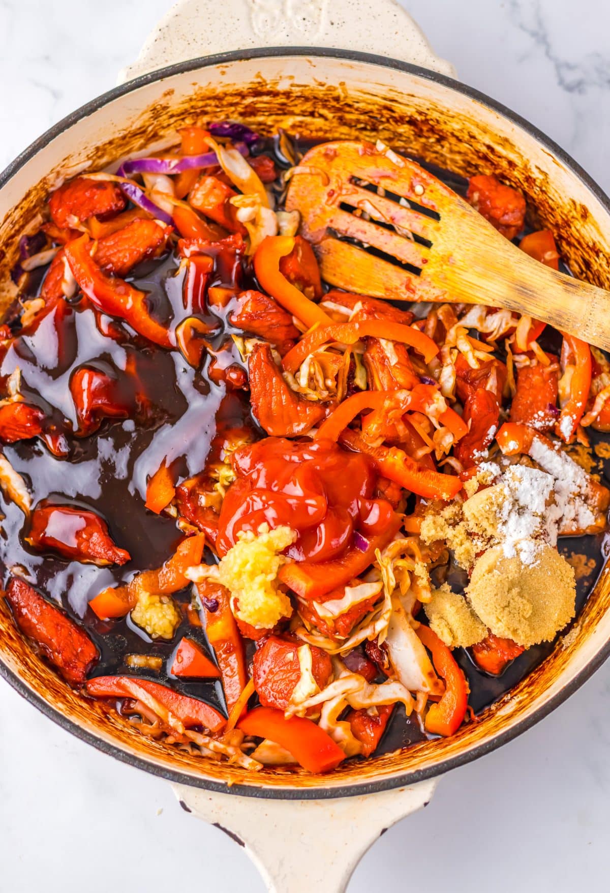 pork lo mein ingredients in a large skillet