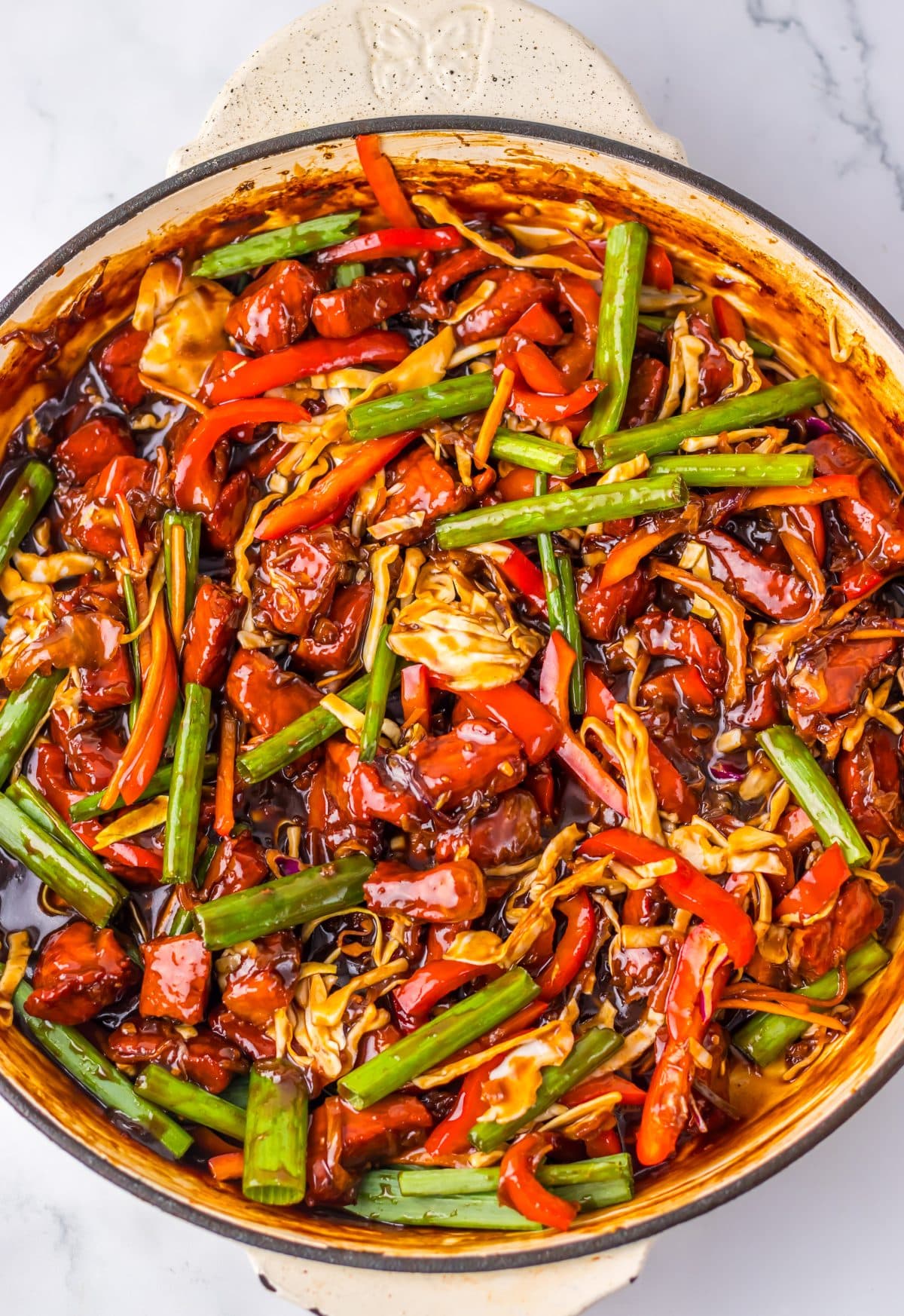 homemade pork lo mein in a large skillet