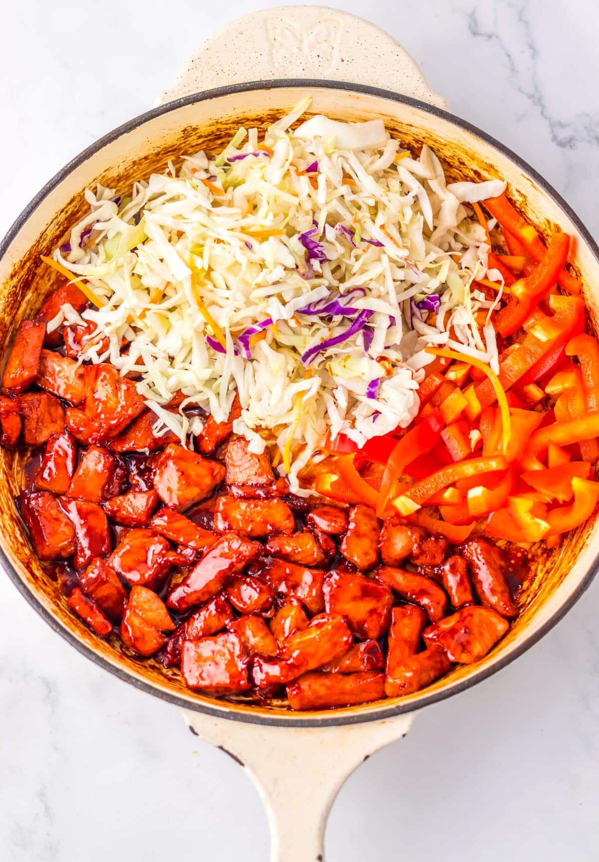 pork lo mein ingredients in a large skillet
