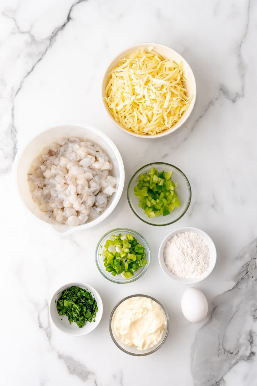 an overhead image showing the measured ingredients to make a batch of fried shrimp fritters