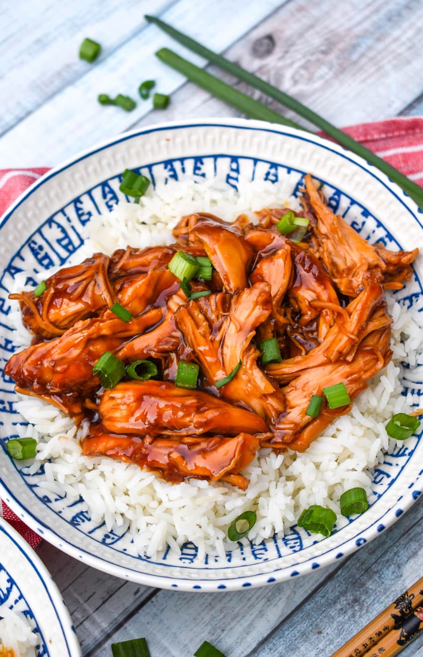 instant pot chicken teriyaki over steamed white rice in a white bowl