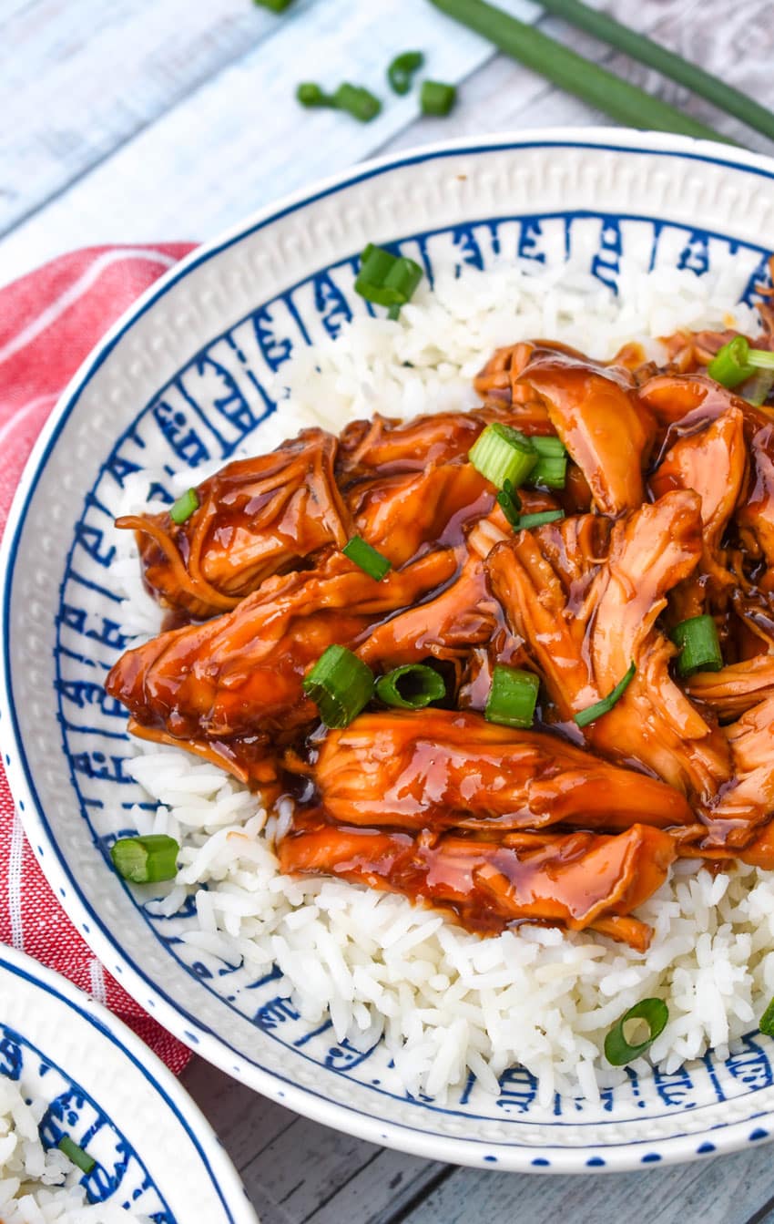 instant pot chicken teriyaki over steamed white rice in a white bowl