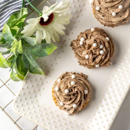 disney's the grey stuff piped into swirls on a white serving platter