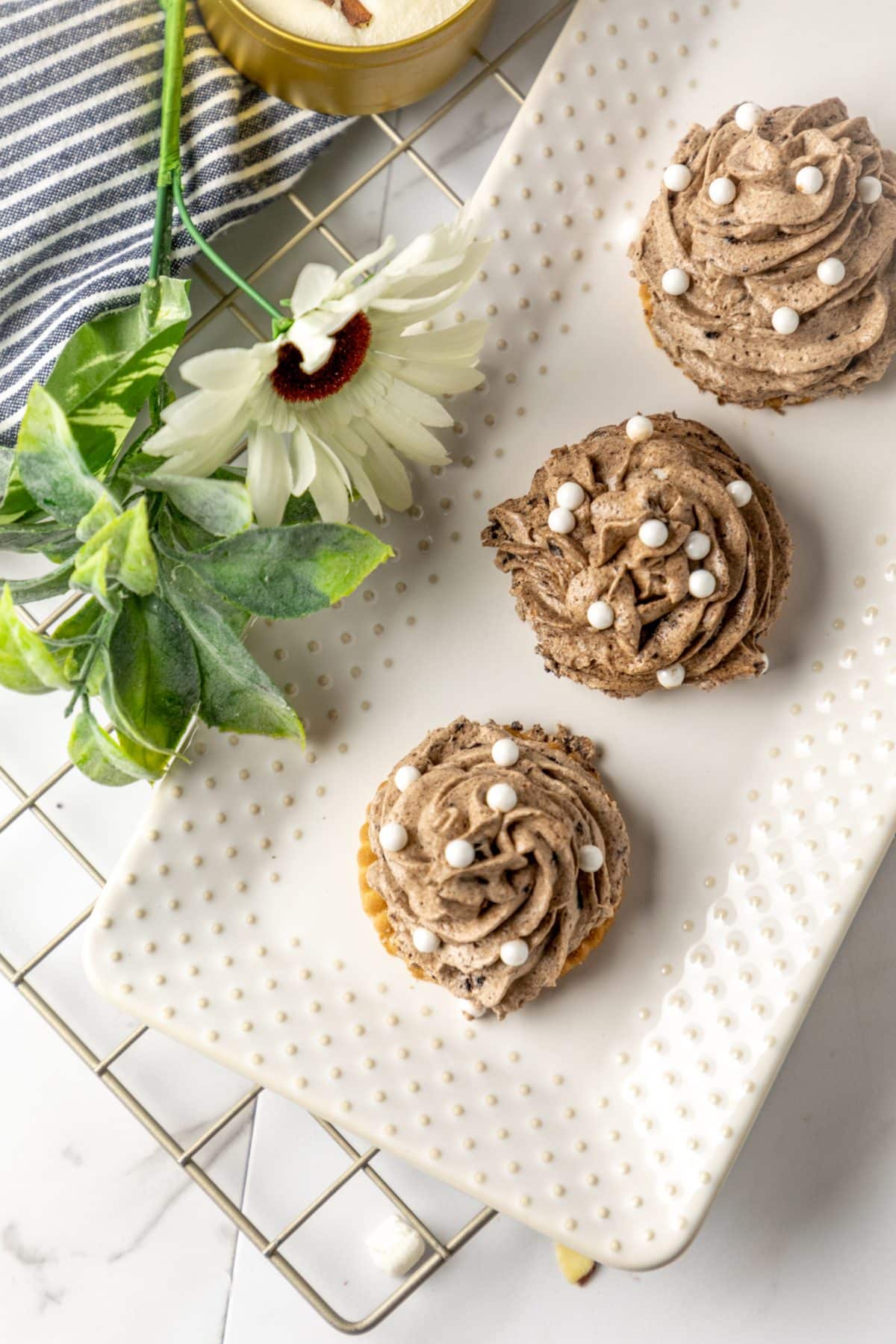 disney's the grey stuff piped into swirls on a white serving platter