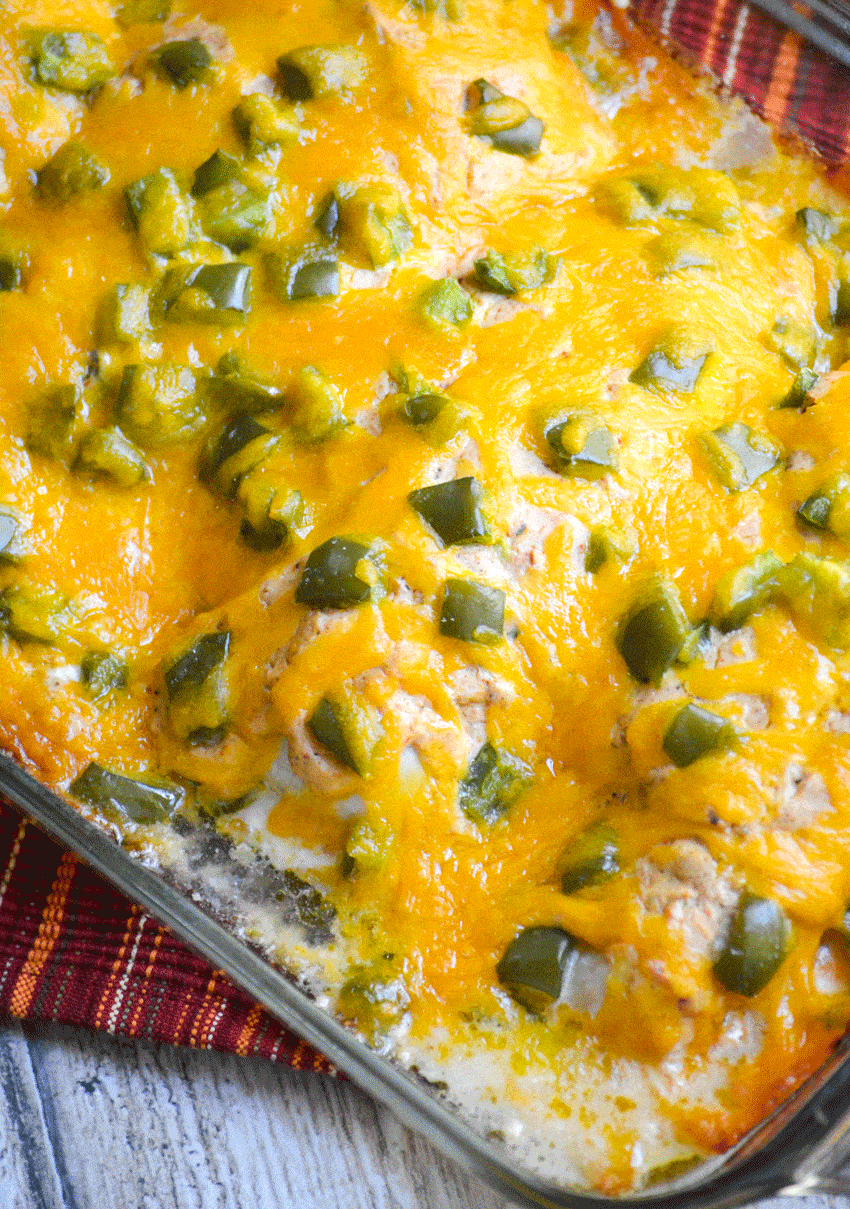 baked cheesy fajita chicken in a glass baking dish