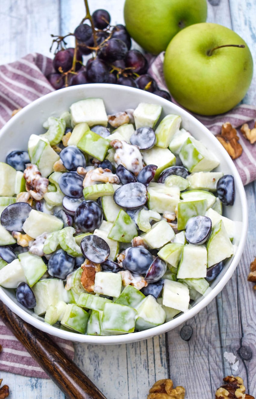 classic waldrof salad in a white serving bowl
