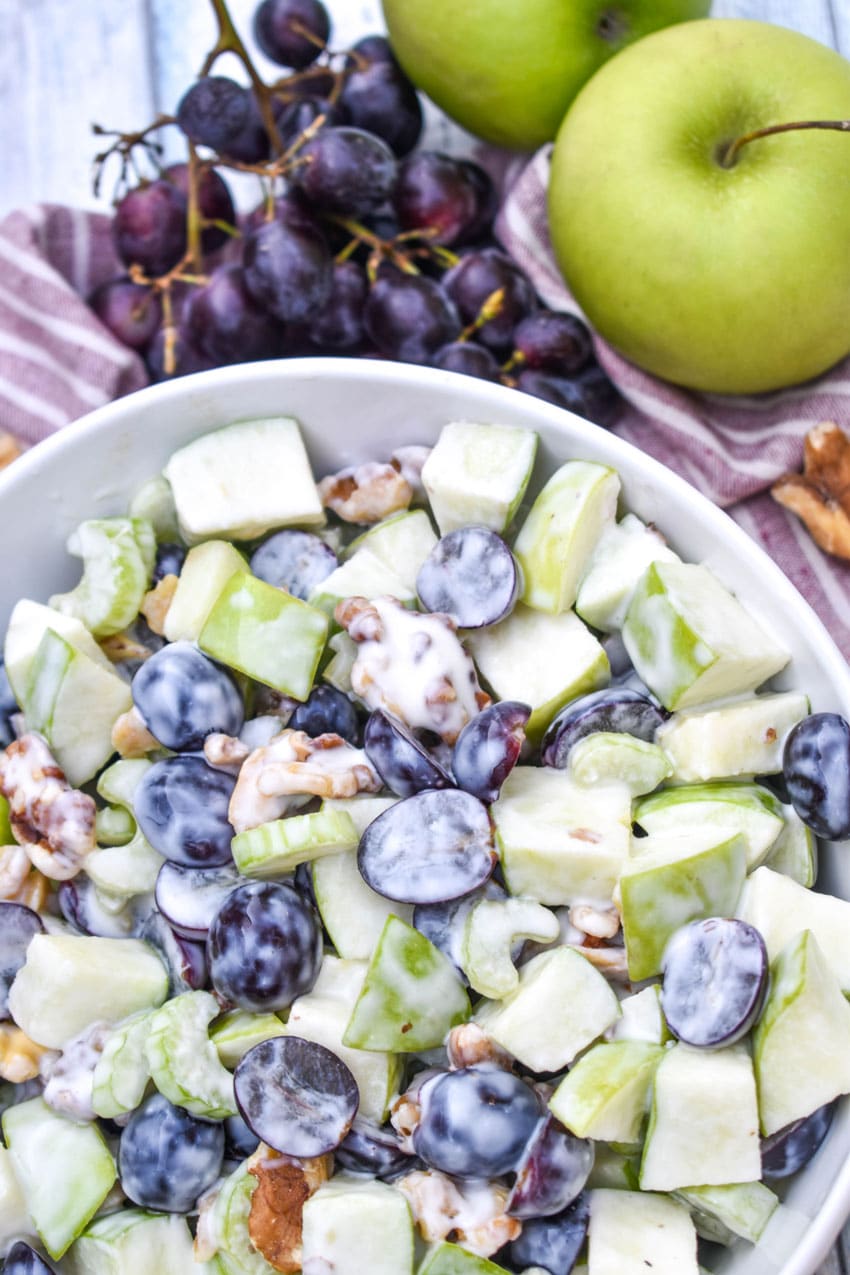 classic waldrof salad in a white serving bowl