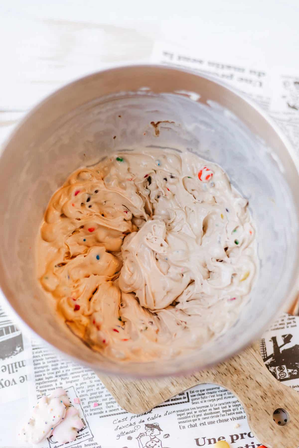 homemade m&m's blizzard ingredients in a metal mixing bowl