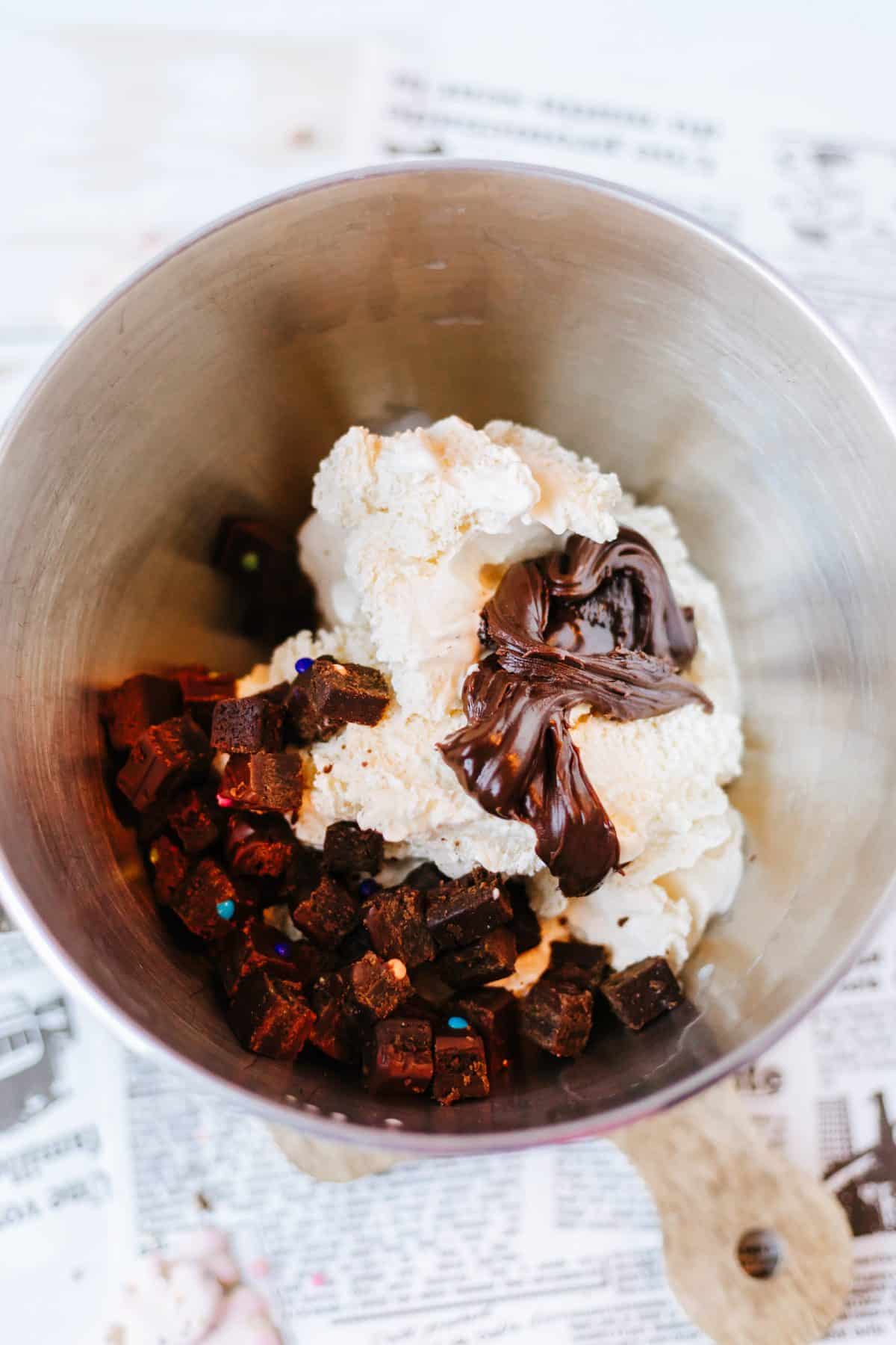 cosmic brownie blizzard ingredients in a large metal mixing bowl