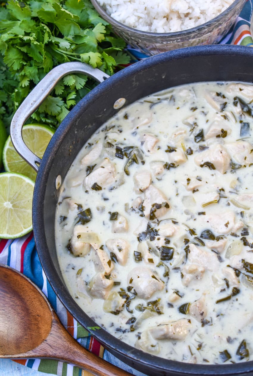 CREAMY POBLANO CHICKEN IN A LARGE BLACK SKILLET