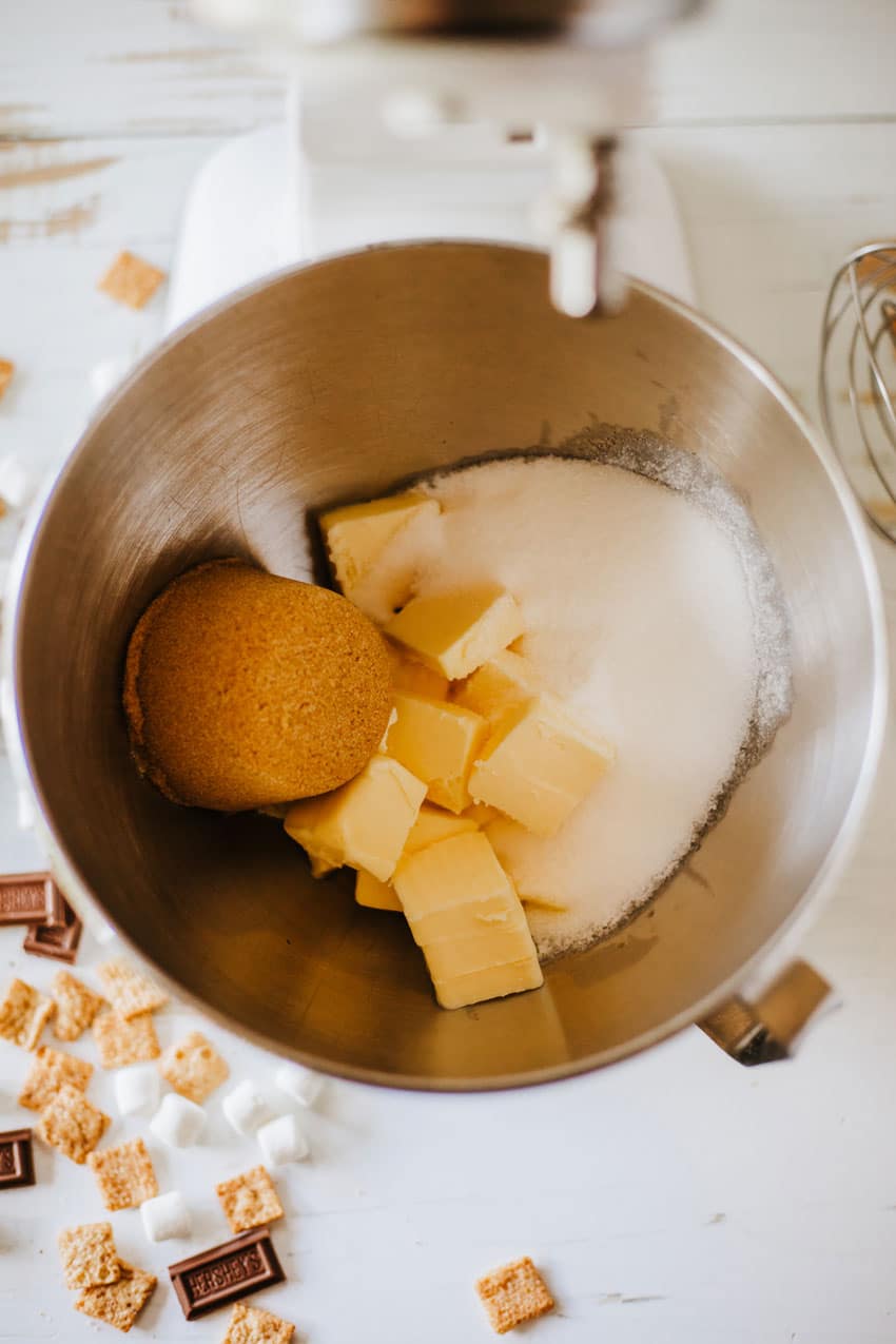 cookie cake ingredients in a metal mixing bowl