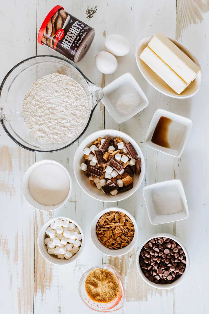 an overhead image showing the measured ingredients needed to make a s'mores cookie cake