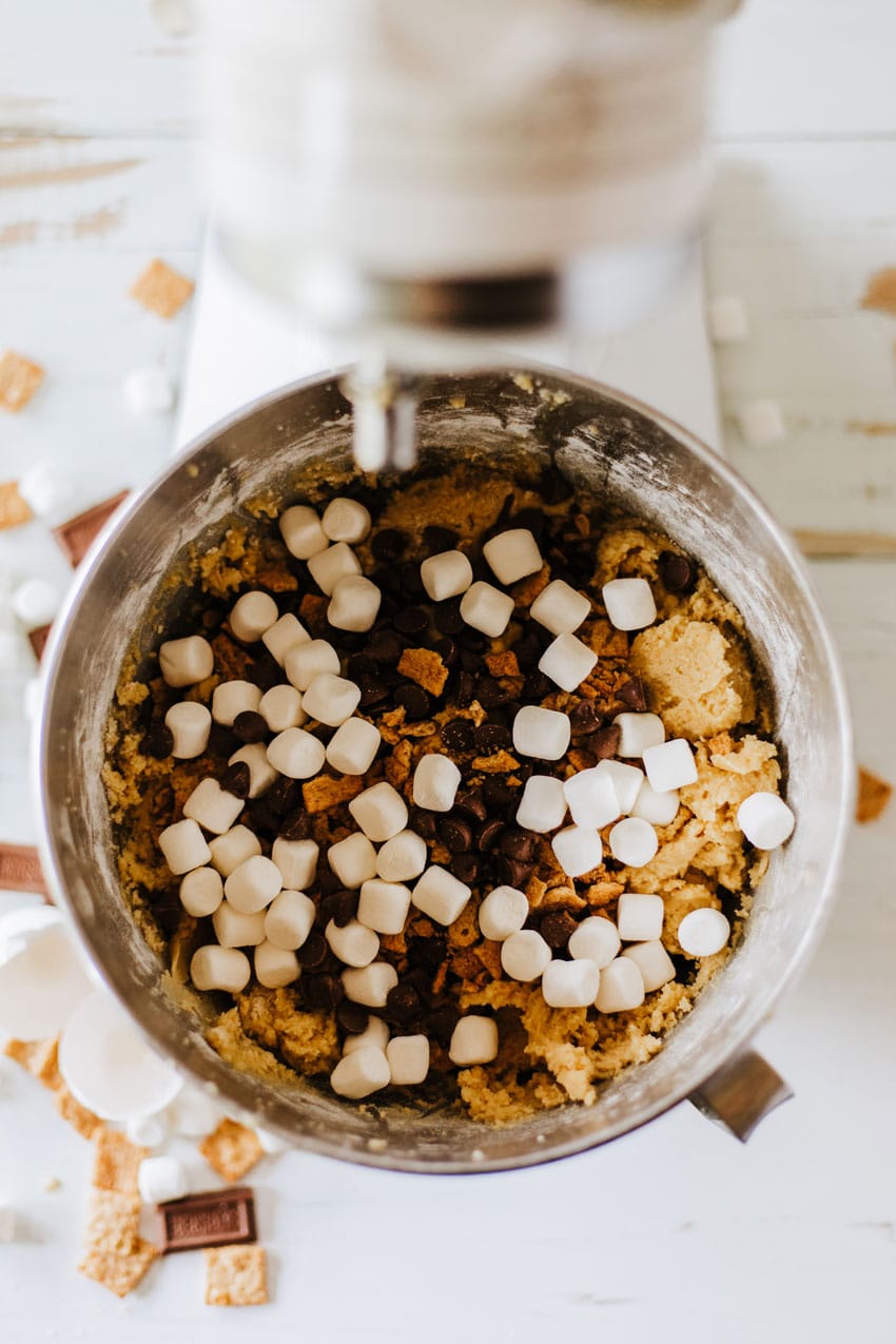 cookie cake batter ingredients in a metal mixing bowl