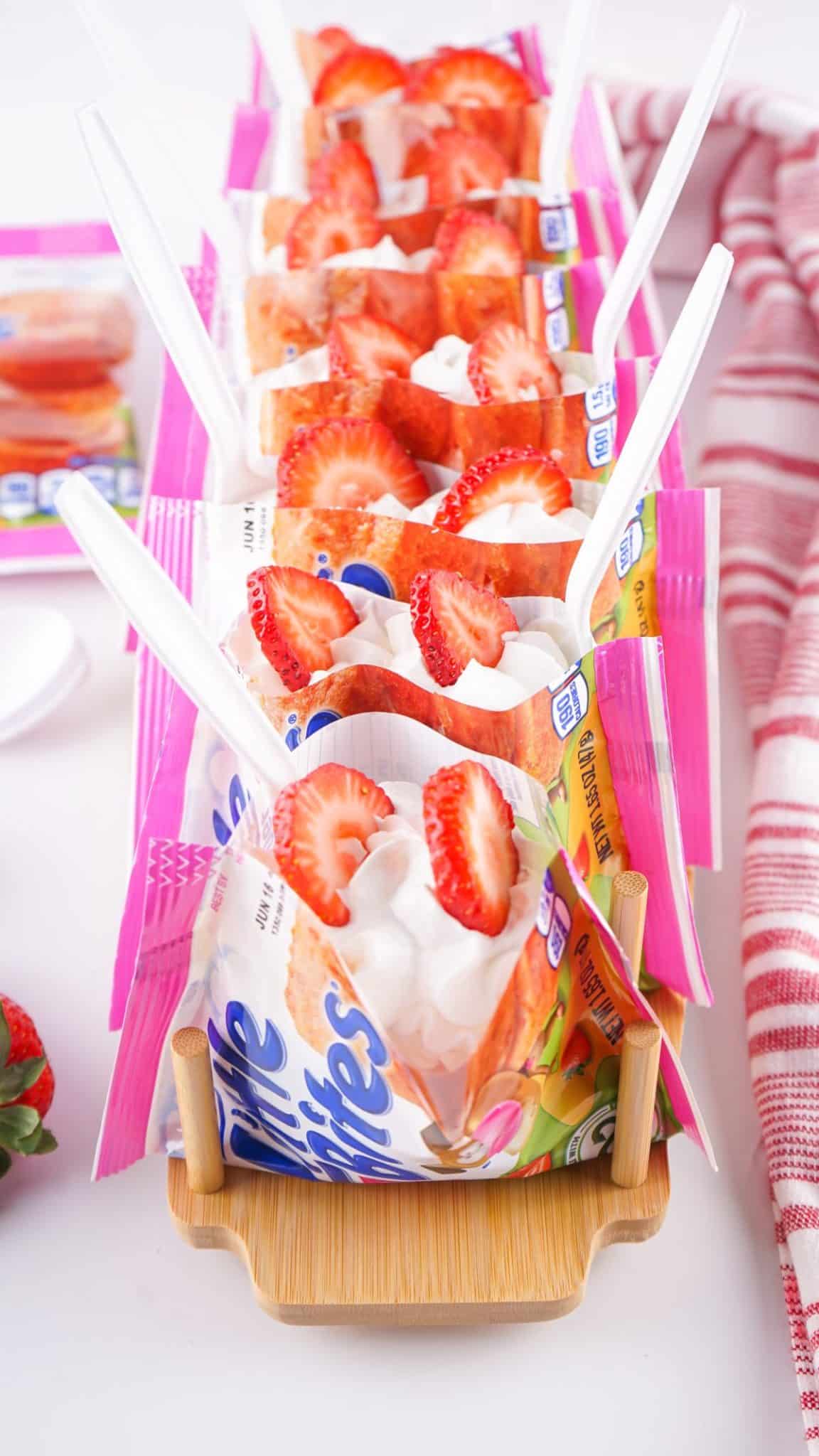 walking strawberry shortcake dessert sitting up and arranged in a row