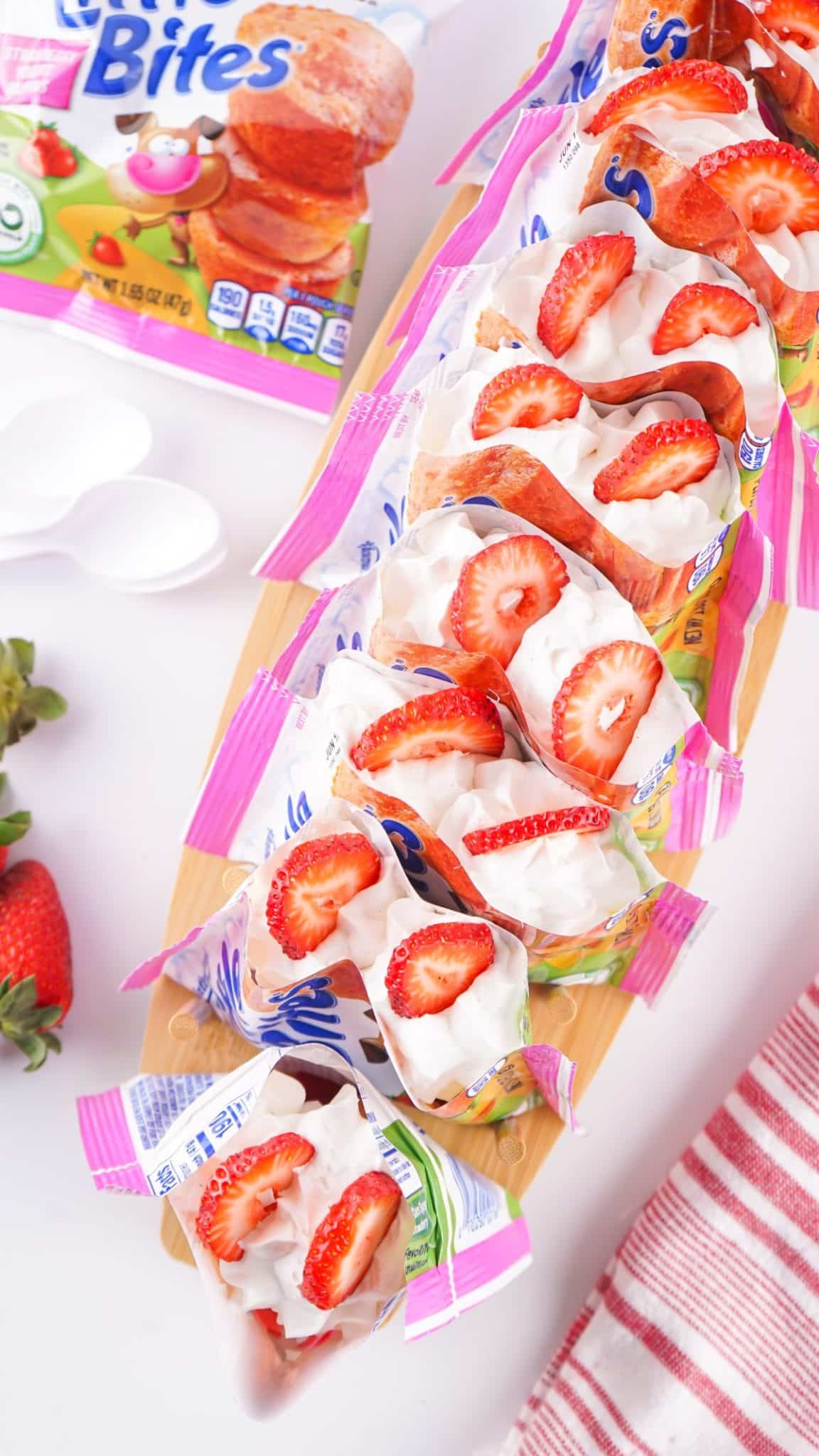 walking strawberry shortcake dessert sitting up and arranged in a row