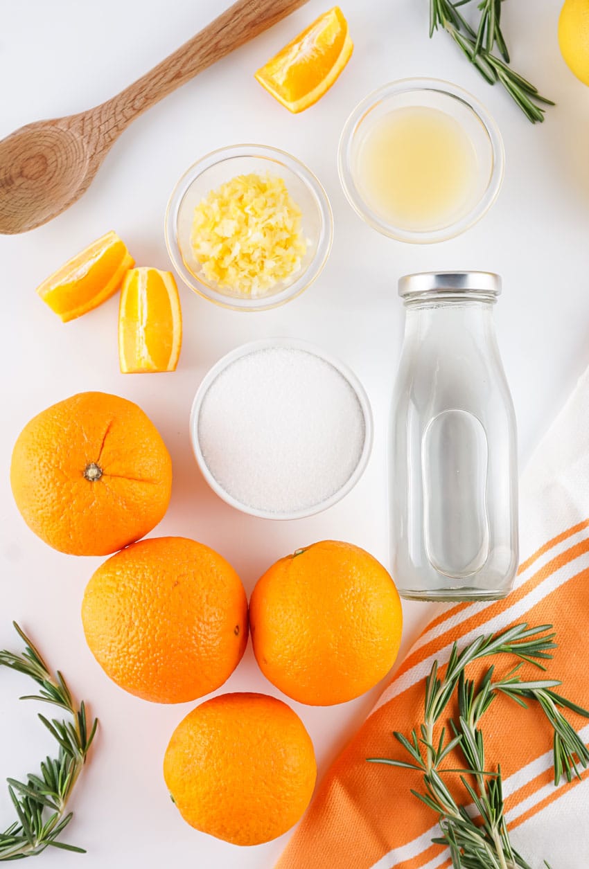 an overhead image showing the measured ingredients needed to make a batch of homemade orange marmalade made without pectin
