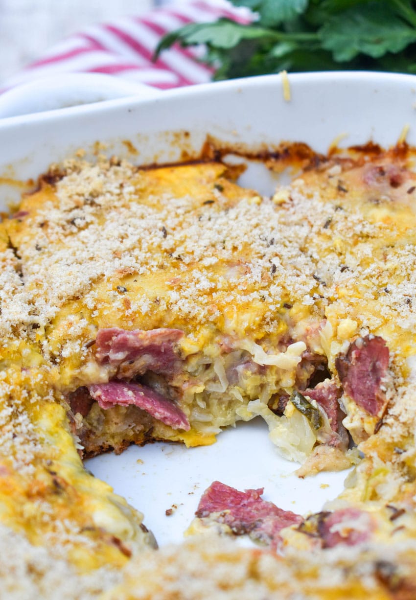 a reuben casserole with a slice removed to reveal the center layers