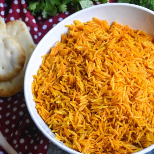 instant pot tikka masala rice in a white serving bowl