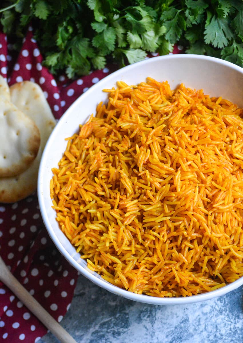 instant pot tikka masala rice in a white serving bowl