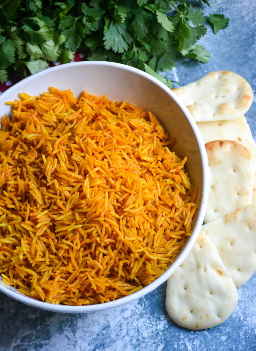 instant pot tikka masala rice in a white serving bowl