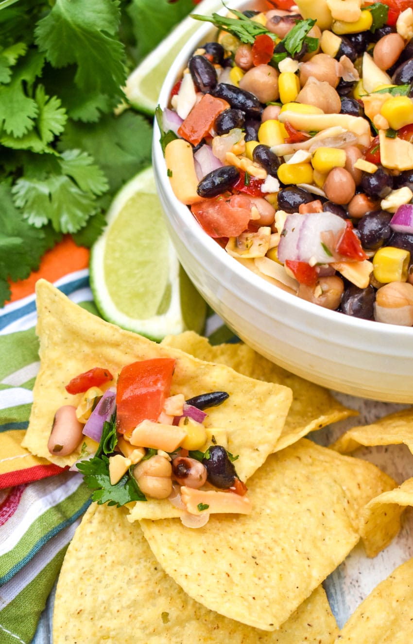 cowboy caviar dip on a tortilla chip