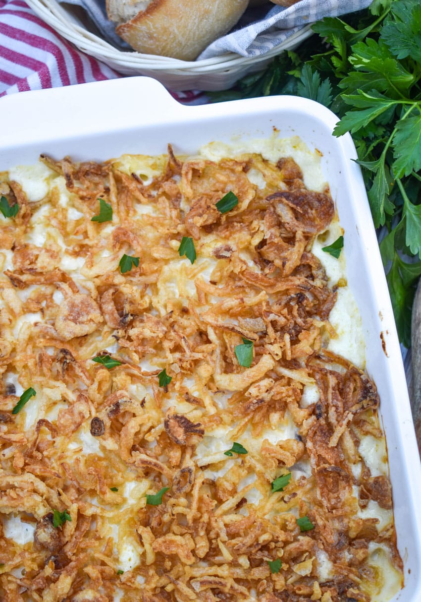french onion chicken casserole in a white baking dish