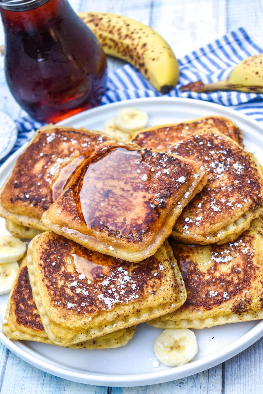 a pile of uncrushable french toast on a white plate