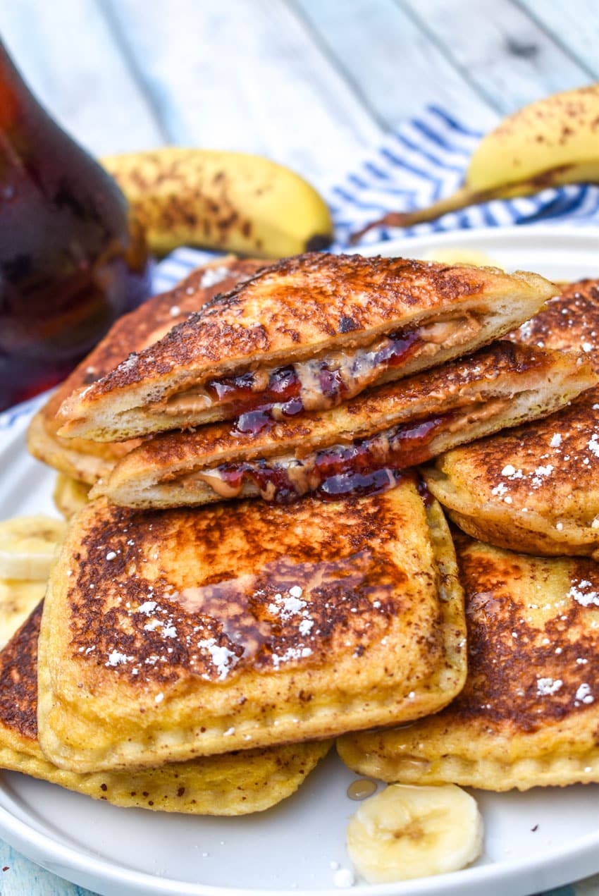 a pile of uncrushable french toast on a white plate