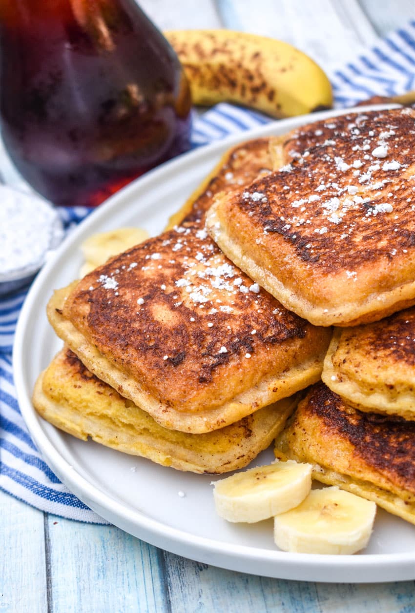 a pile of uncrushable french toast on a white plate