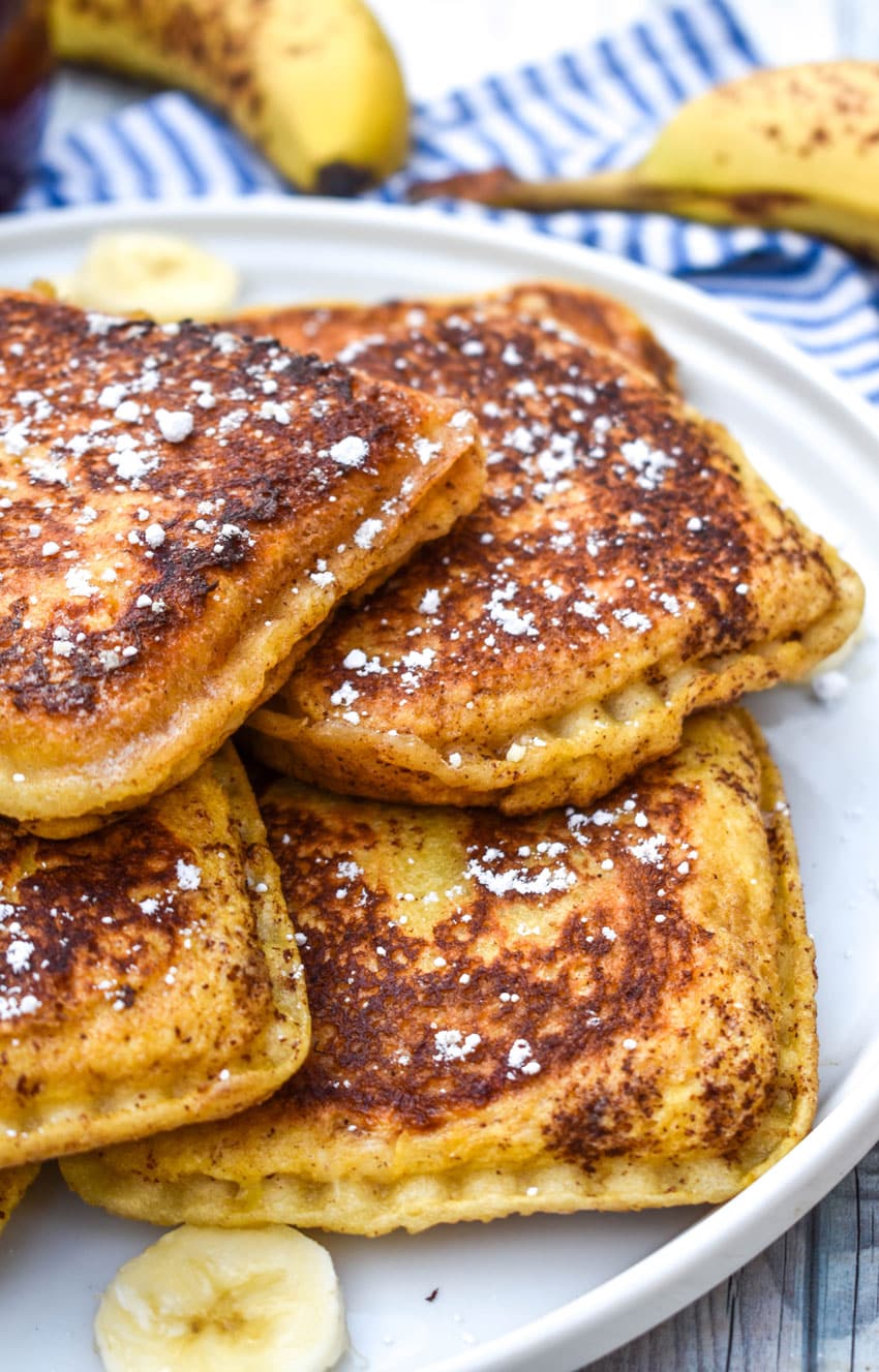 a pile of uncrushable french toast on a white plate