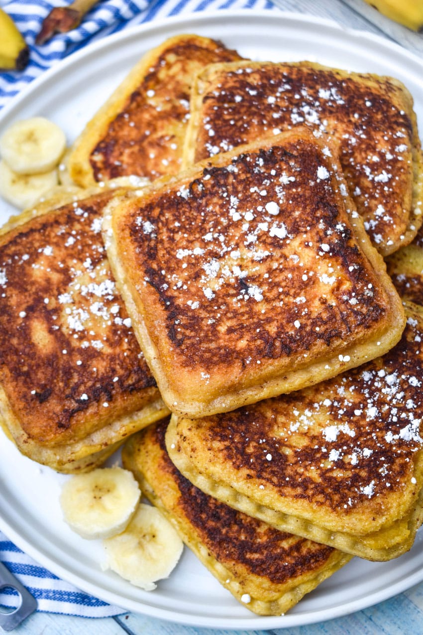 a pile of uncrushable french toast on a white plate