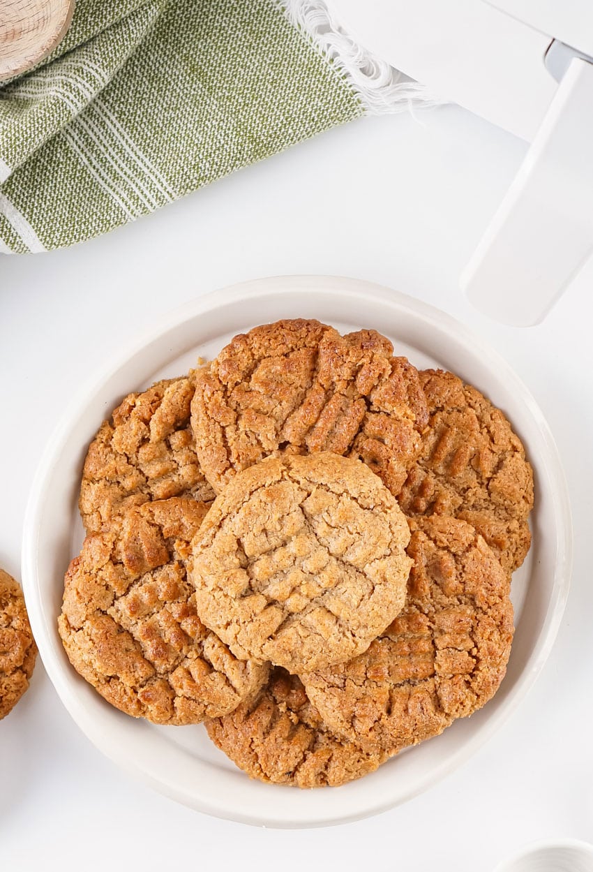 air fried almond butter cookies on a white plate