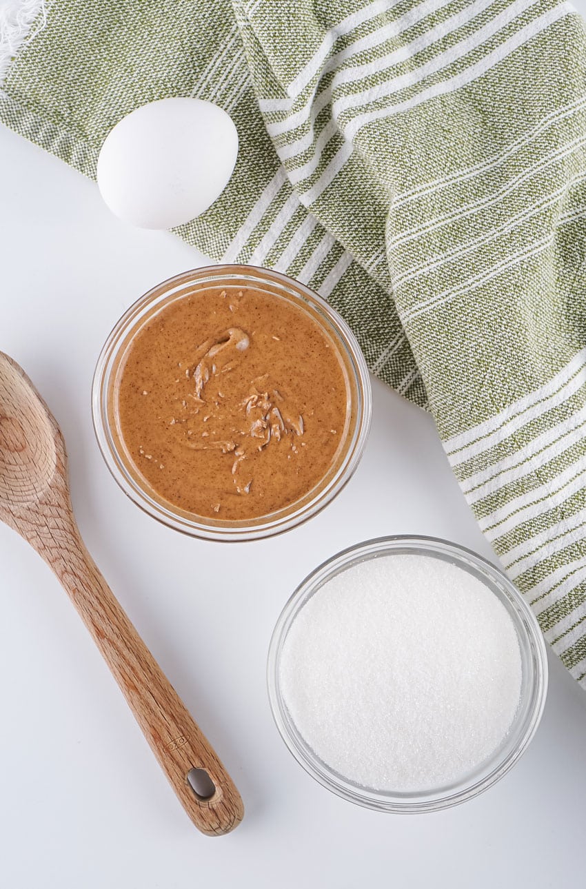 an overhead image showing the measured ingredients needed to make a batch of air fryer almond butter cookies