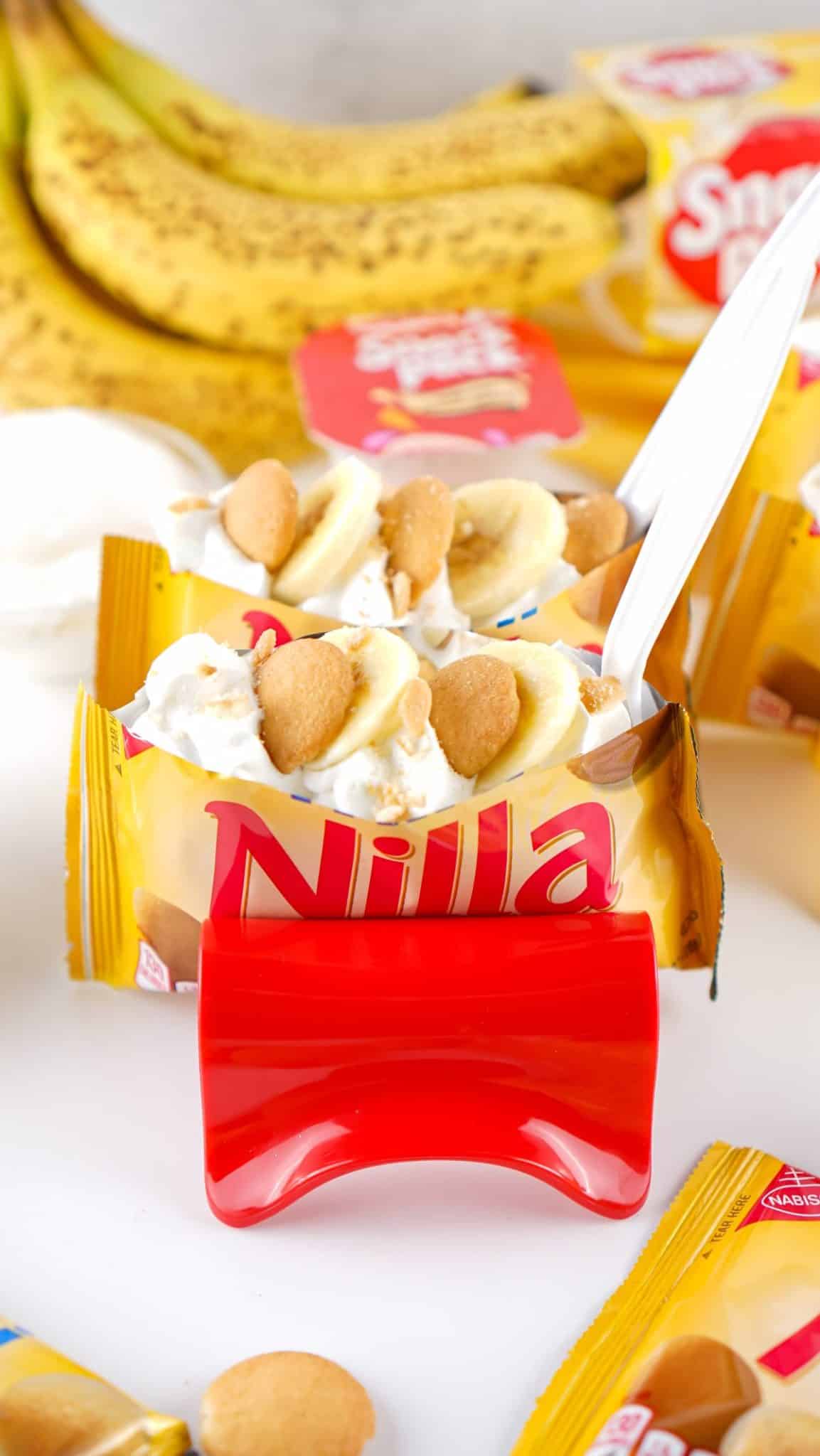walking banana pudding desserts in a plastic stand